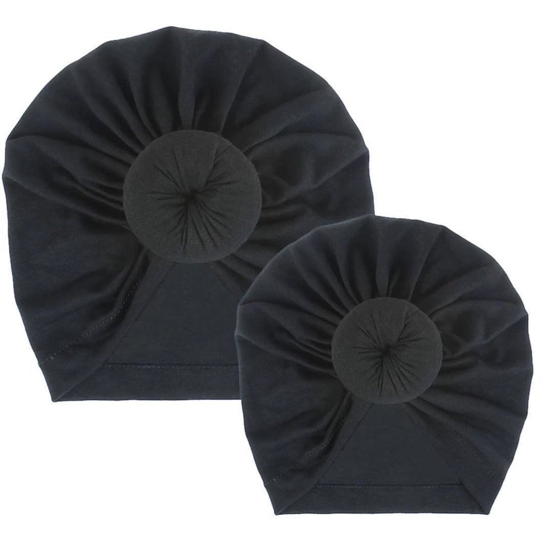 AQueenzDen black cotton top knot turban set for mom and baby, featuring a pre-tied knot detail.
