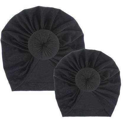 AQueenzDen black cotton top knot turban set for mom and baby, featuring a pre-tied knot detail.
