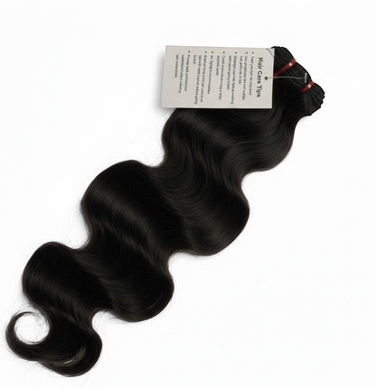 AQueenzDen black virgin human hair bundles with body wave texture, dyeable and bleach friendly.