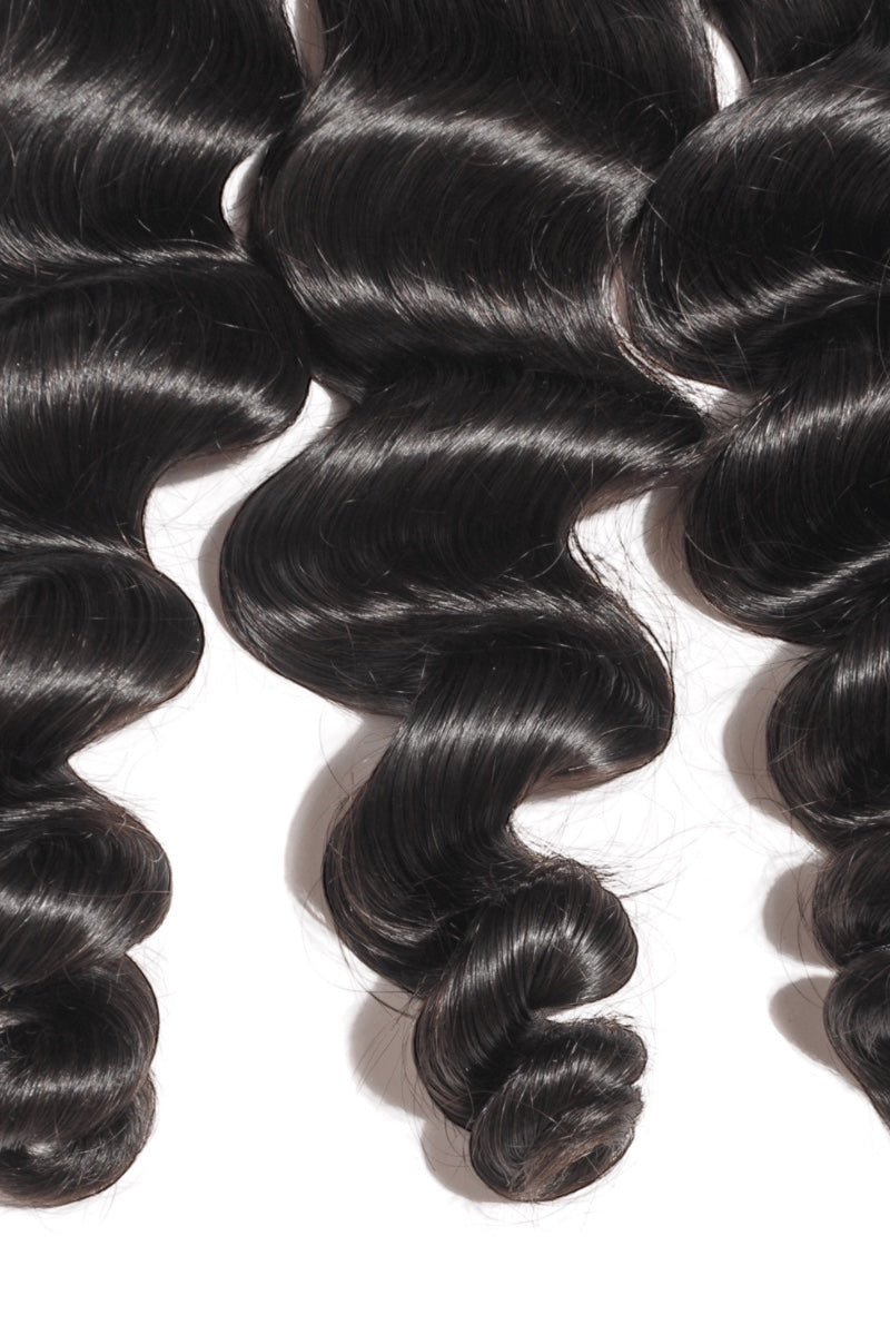 AQueenzDen black Brazilian premium virgin human hair bundles with body wave texture.