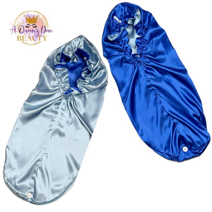 A Queenz Den double layer long satin hair bonnet in light blue and royal blue, reversible design for thick hair.