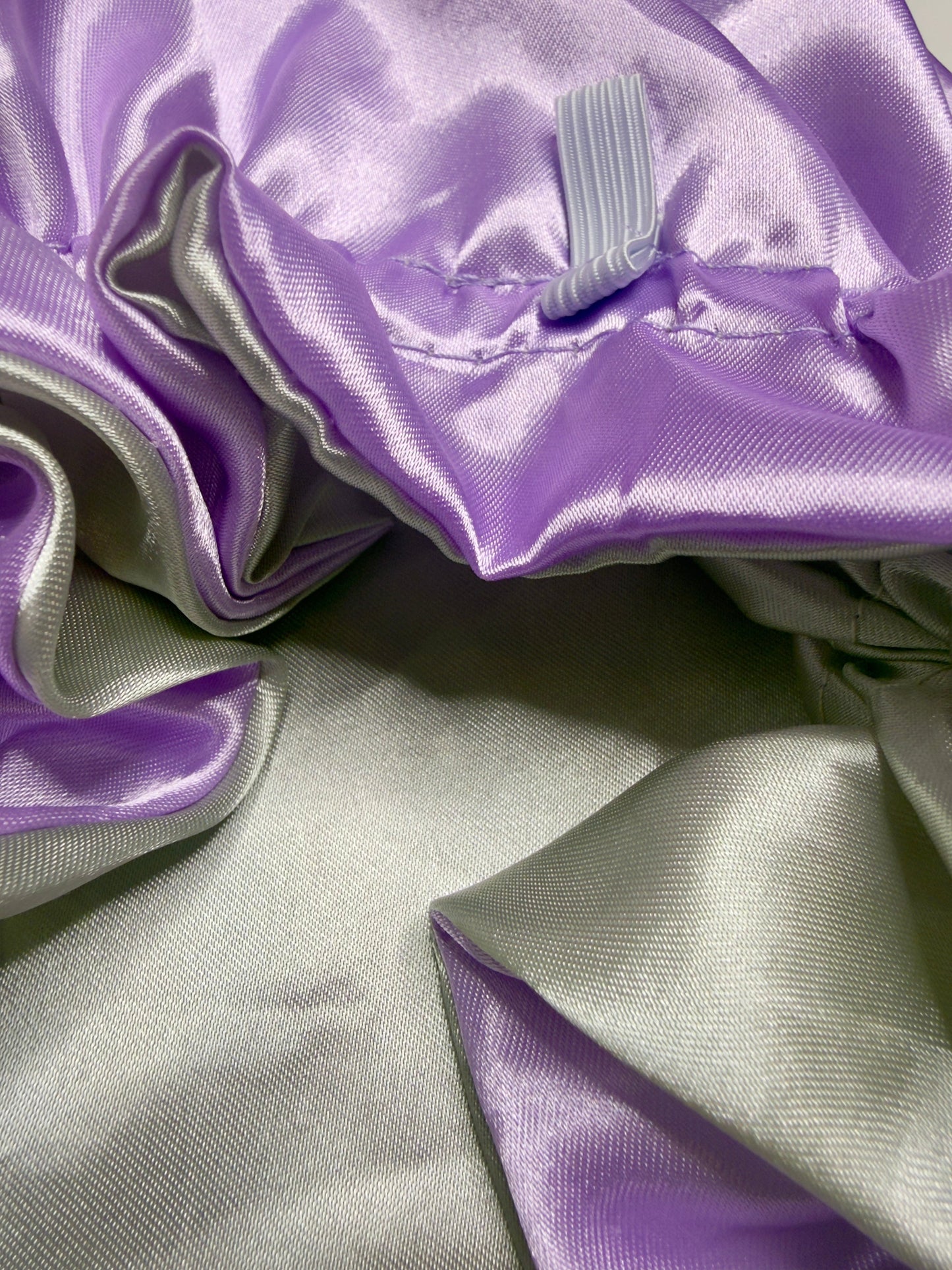 AQueenzDen reversible double layer satin hair bonnet in lavender and silver, perfect for long, thick hair.