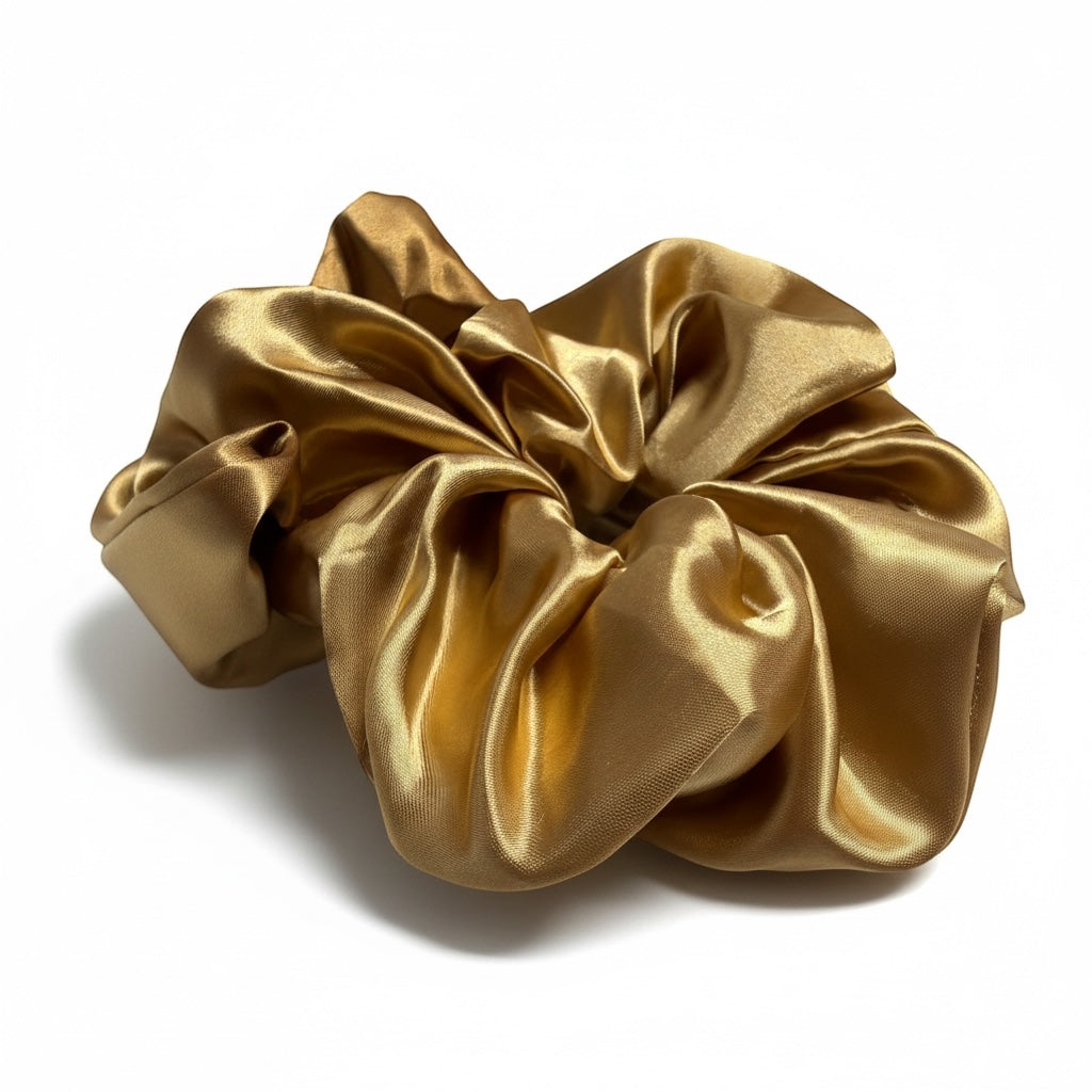 AQueenzDen medium-sized gold satin hair scrunchie with a smooth, silky finish.