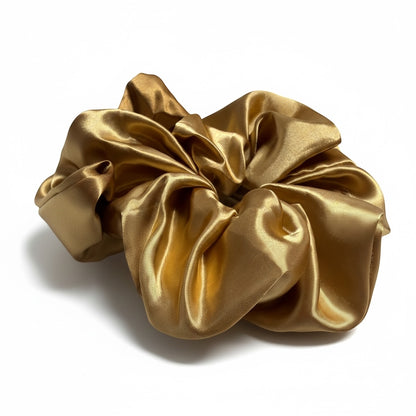AQueenzDen medium-sized gold satin hair scrunchie with a smooth, silky finish.