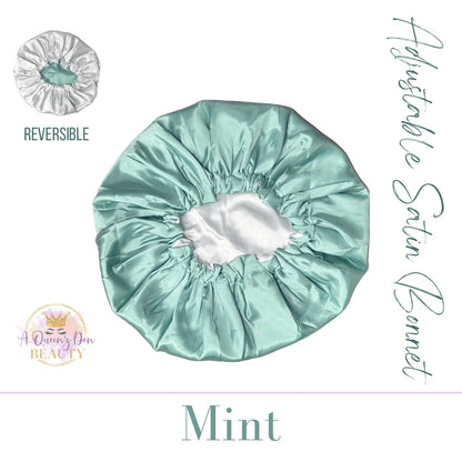AQueenzDen mint green and white reversible satin bonnet for natural hair, adjustable fit, double layer protection.
