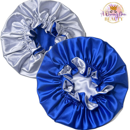 AQueenzDen reversible satin bonnet in royal blue and silver, featuring adjustable tie and double layer protection for natural hair.