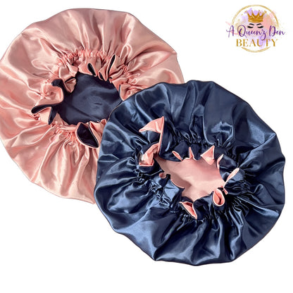 AQueenzDen reversible satin bonnet in navy blue and pink, adjustable double layer for natural hair.