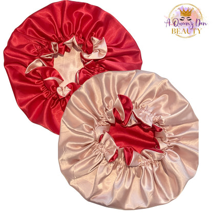 AQueenzDen reversible satin bonnet in red and champagne pink. Double layer, adjustable fit for natural hair.