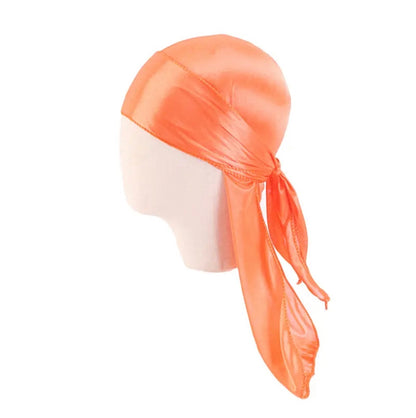 AQueenzDenHere orange silk satin durag for children, featuring adjustable ties for a secure fit.